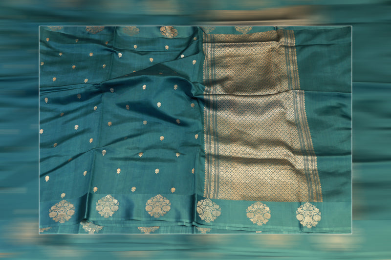 Pure handloom katan cutwork raw mango dark green saree